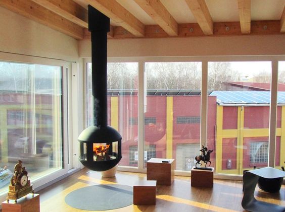 Wood burning fireplace. central glass fireplace. focus fires