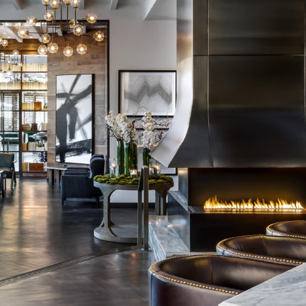 linear gas fireplace in modern hotel lobby