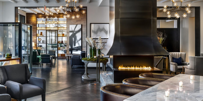 linear gas fireplace in modern hotel lobby