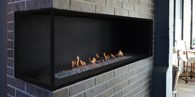 H Series corner style vent free fireplace with glass fire media and matte black interior with safety screen