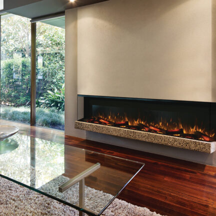 Blazing fire in living room of luxury architect designed house